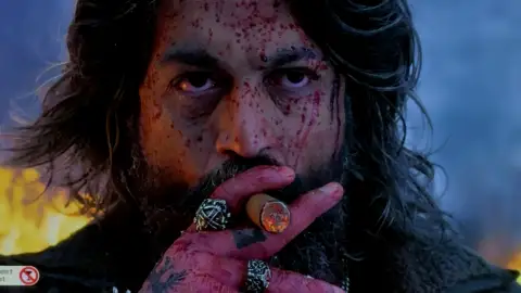 Still 13 of Toxic (2026) V2 HQ-HDTC [Hindi-Kannada-Tamil-Telugu] (LiNE) 1080p 720p & 480p Multi Audio [x264/HEVC]