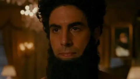 Still 1 of The Dictator (2012) UNRATED BluRay [Hindi (ORG 5.1) & English] 1080p 720p & 480p Dual Audio [x264/10Bit-HEVC]